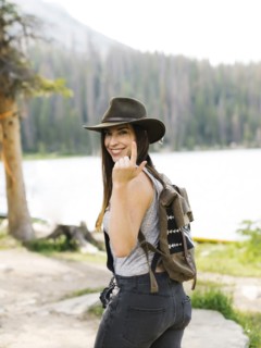 Portrait of woman hiking by lake