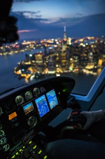 USA, New York, New York City, City at night seen from helicopter