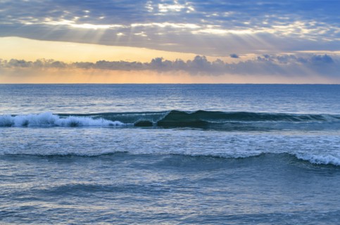 USA, Florida, Ocean waves at sunset