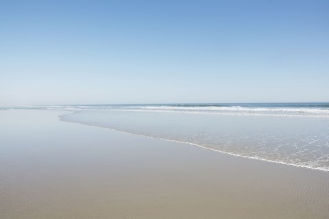 Empty beach on sunny day