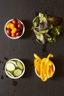 Yellow pepper, tomatoes, cucumber and greens