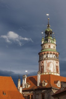 Czech Republic, South Bohemia, Cesky Krumlov, Castle tower against storm clouds