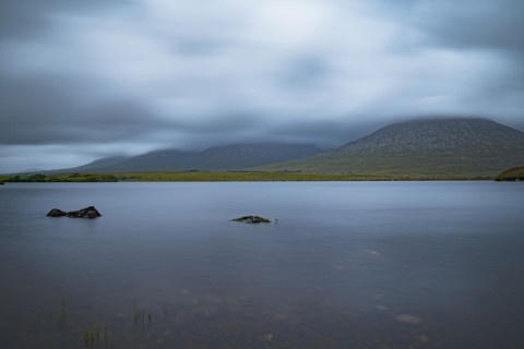 Ireland, Galway County, Connemara, Clouds over lake