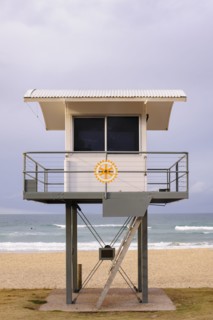 Australia, New South Wales, Lifeguard hut against storm clouds