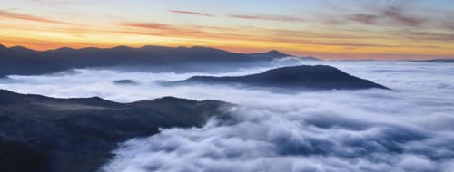 Ukraine, Zakarpattia region, Rakhiv district, Carpathians, Chornohora, Sheshul, Mist over mountains at dawn