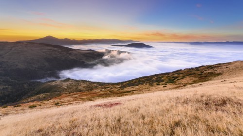 Ukraine, Zakarpattia region, Rakhiv district, Carpathians, Chornohora, Sheshul, Mist over mountains at dawn
