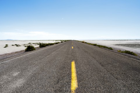 USA, Utah, Wendover, Bonneville Salt Flats, Blue sky over empty road