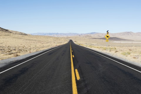 USA, Nevada, Highway 50, Clear sky over empty road