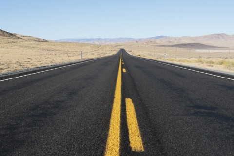 USA, Nevada, Highway 50, Clear sky over empty road