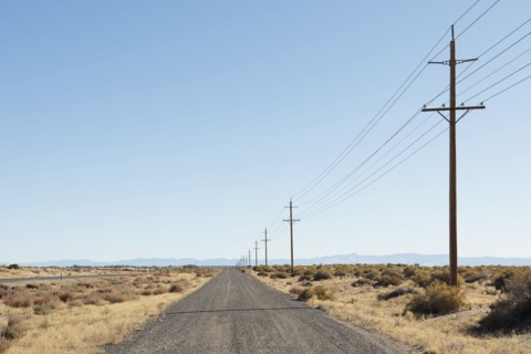 USA, Nevada, Highway 50, Electricity pylons next to road