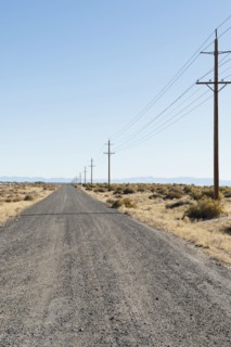 USA, Nevada, Highway 50, Electricity pylons next to road