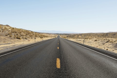 USA, Nevada, Highway 50, Clear sky over empty road