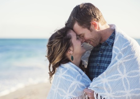 Couple embracing on beach