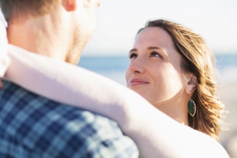 Couple embracing in beach