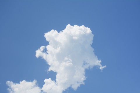 White cumulus cloud on blue sky