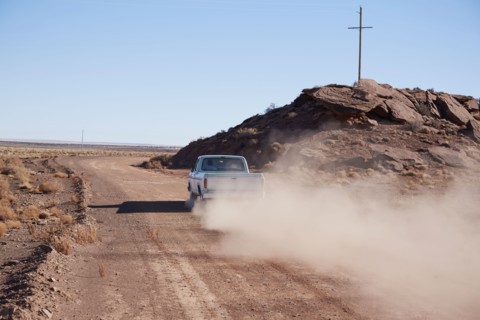 USA, Arizona, Pick up truck on dusty road