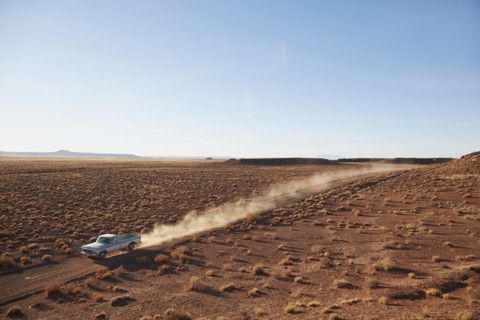 USA, Arizona, Pick up truck going through desert on Route 66