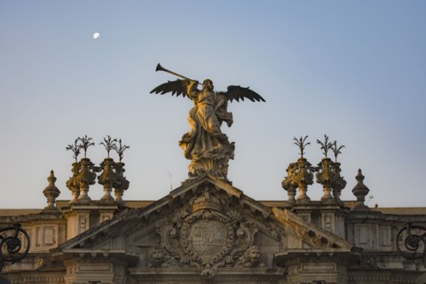 Spain, Seville, Statue of angel with trumpet
