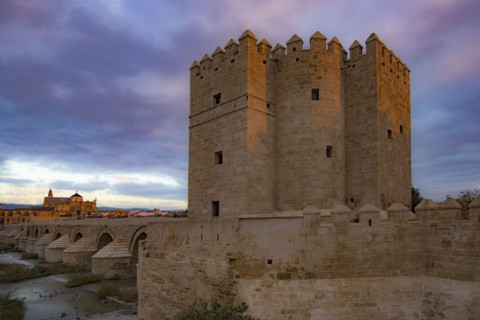 Spain, Andalusia, Cordoba, Facade of old church near bridge over Guadalquivir river