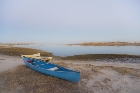 USA, Massachusetts, Cape Cod, Eastham, Blue canoe on beach