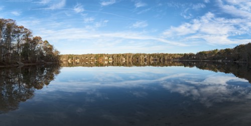USA, Massachusetts, Cape Cod, Falmouth, Panoramic view of pond with reflection