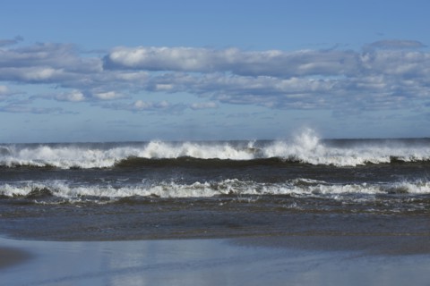 Waves splashing onto beach