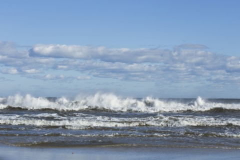 Waves splashing onto beach