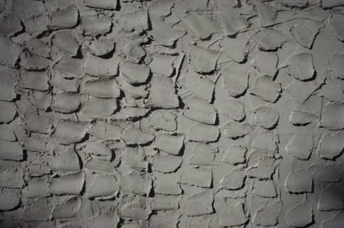Textured grey cement wall