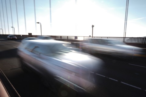 USA, California, San Francisco, Golden Gate Bridge, Cars in blurred motion