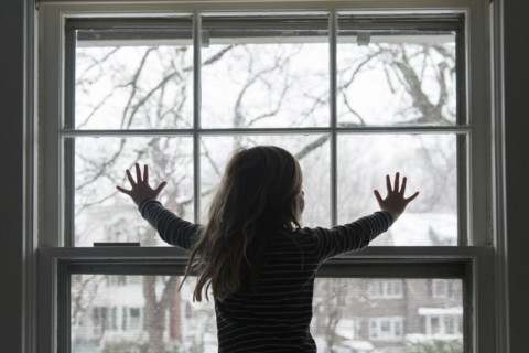Girl by window