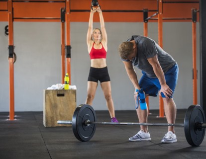 Man and woman working out
