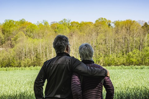 Mature couple in field
