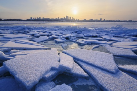 Ice on river at sunset