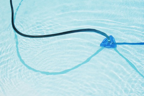 Pool vacuum in swimming pool