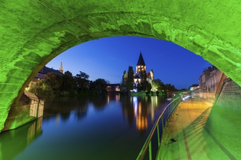 Temple Neuf and illuminated bridge in Metz, France