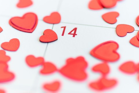 Red hearts on Valentine's Day box on calendar