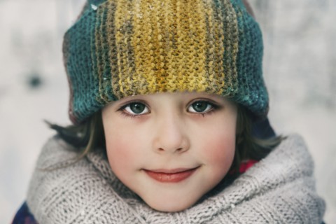 Girl in woollen hat during winter
