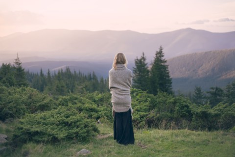 Woman wrapped in blanket in the Carpathian Mountain Range