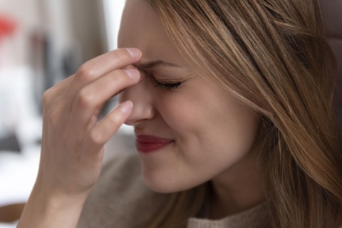 Young woman with headache