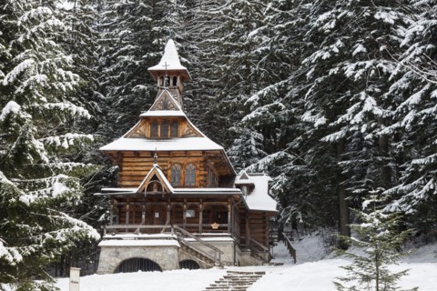 Chapel of the Sacred Heart of Jesus in snow in Jaszczurowka, Poland