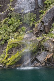 Waterfall in Milford Sound, New Zealand