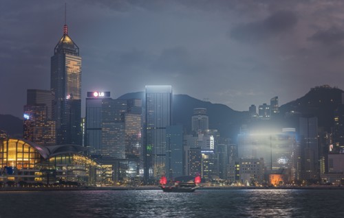 City skyline at sunset in Hong Kong, China