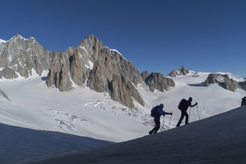 Silhouettes of hikers on Mer de Glace in Mont Blanc massif, France