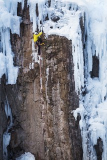 Man ice climbing in Ouray, USA