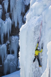 Man ice climbing in Ouray, USA