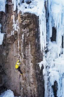 Man ice climbing in Ouray, USA