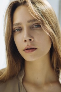 Portrait of young woman wearing natural make-up