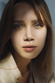 Portrait of young woman wearing natural make-up