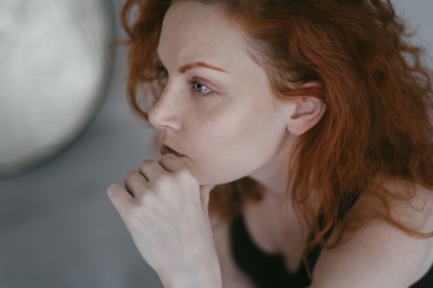 Portrait of redhead young woman
