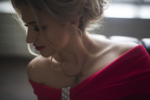 Young woman wearing red lipstick